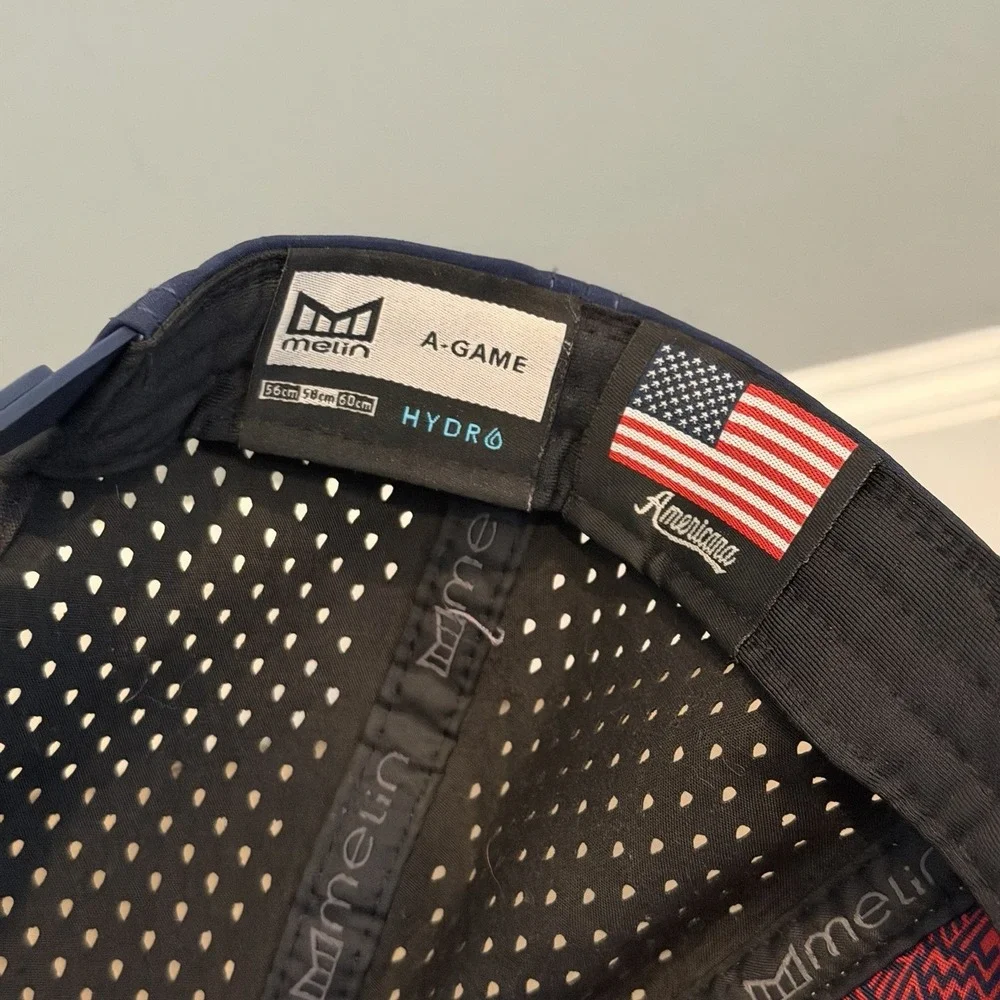 Melin A-Game Hydro Hat Men OSFM Snapback White Navy Blue Americana Patch